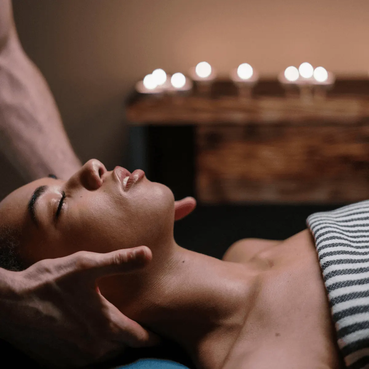 Guest receiving a face and head massage